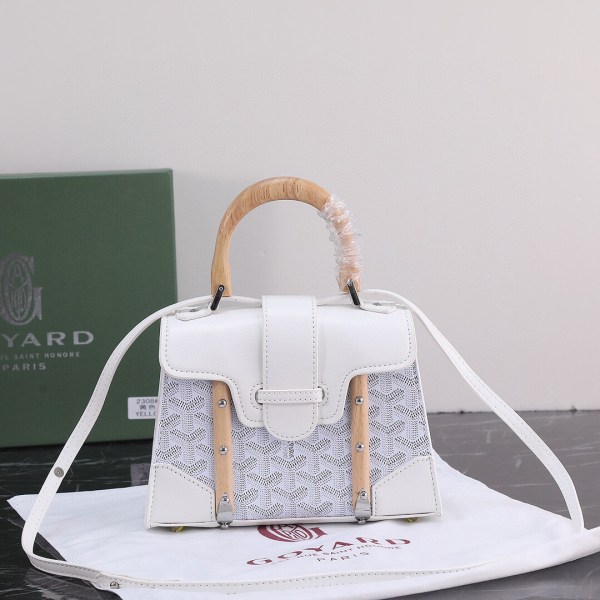 Goyard Black Goyardine Coated Canvas and Leather Saigon MM Top Handle Bag with wooden handle and black body.