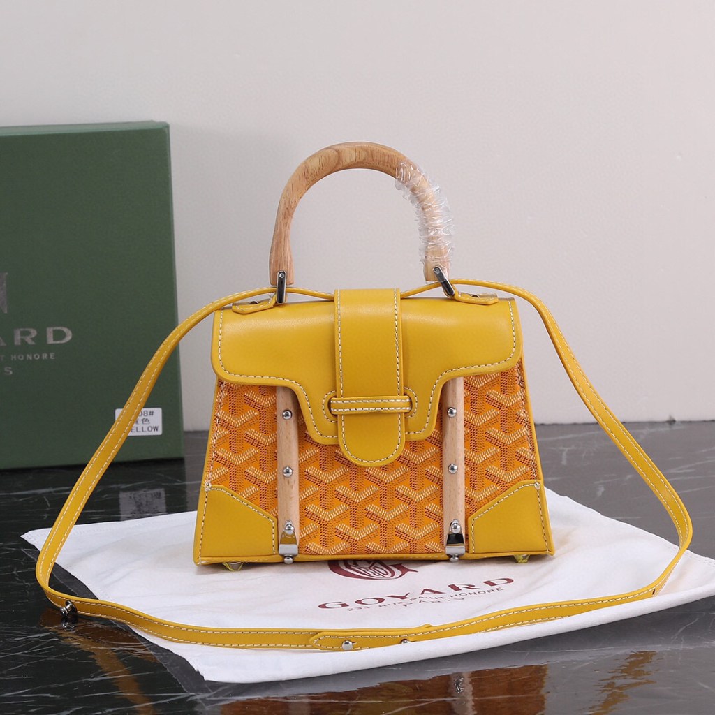 Goyard Yellow Goyardine Coated Canvas and Leather Saigon MM Top Handle Bag with wooden handle and structured flap.