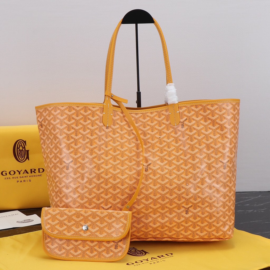 Goyard Yellow Saint GM Canvas Tote Bag with matching yellow pouch.