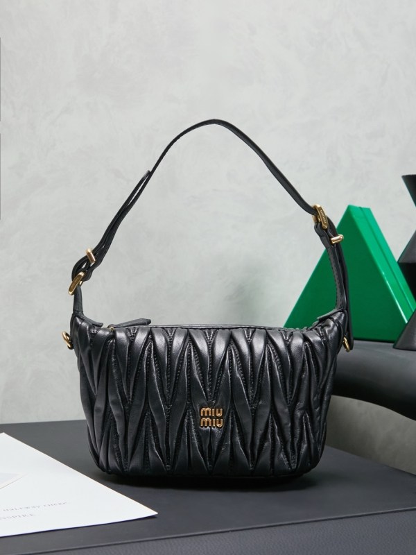 Miu Miu black matelassé mini shoulder bag with gold logo