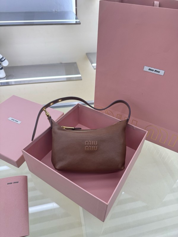 Miu Miu light brown leather paddle shoulder bag in pink box