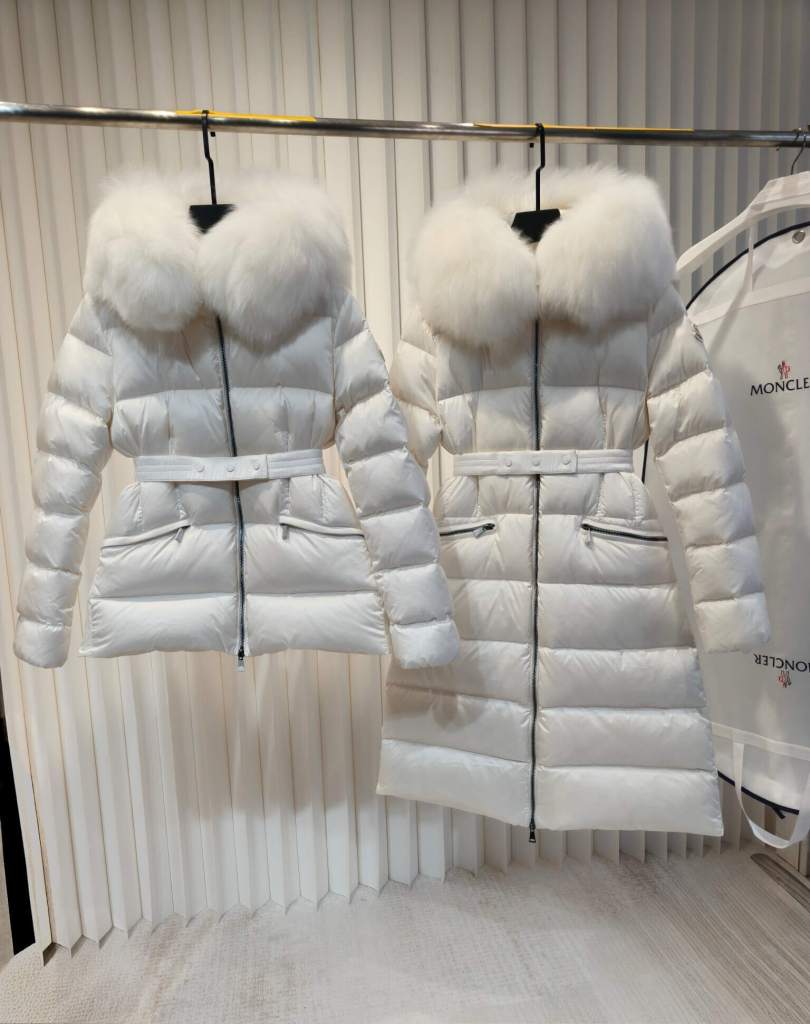 Moncler down jacket with a fur-trimmed hood and belted waist in off-white colorway