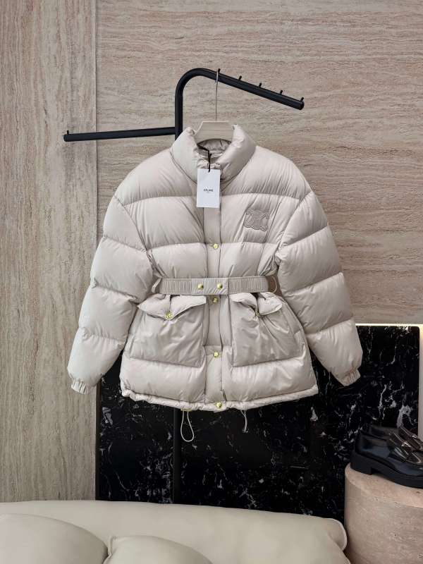 Celine Puffer Jacket with a belted waist in a light beige color.