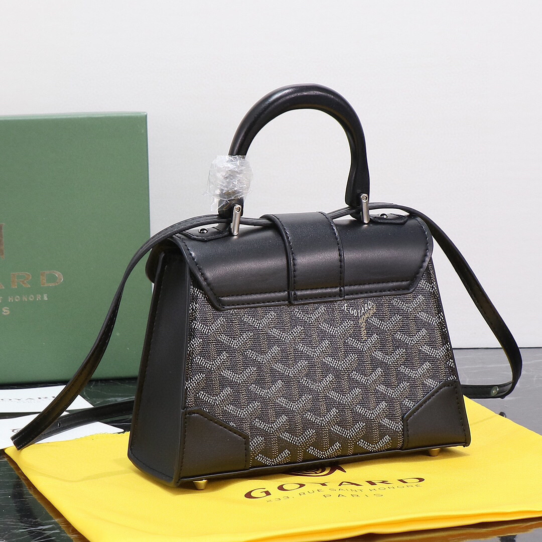 Goyard Saïgon Structuré Mini Bag in Lettres Camouflage-Pink with black leather trim.