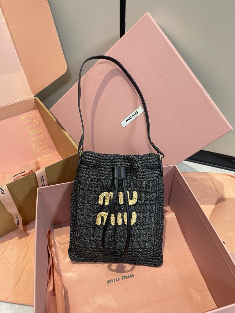 Miu Miu Black Raffia-Effect Woven Mini Bag with yellow embroidered logo, drawstring closure, and slim leather strap, size 20 x 23 cm.