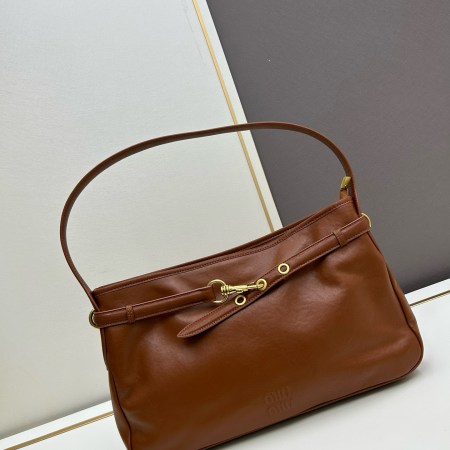 Miu Miu Brown Leather Underarm Shoulder Bag with gold-tone buckle detail, embossed logo, and top zip closure, size 40 x 24 x 5 cm