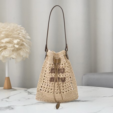 Miu Miu Natural Raffia-Effect Woven Mini Bag with brown logo, leather strap, and drawstring closure, size 20 x 23 cm.