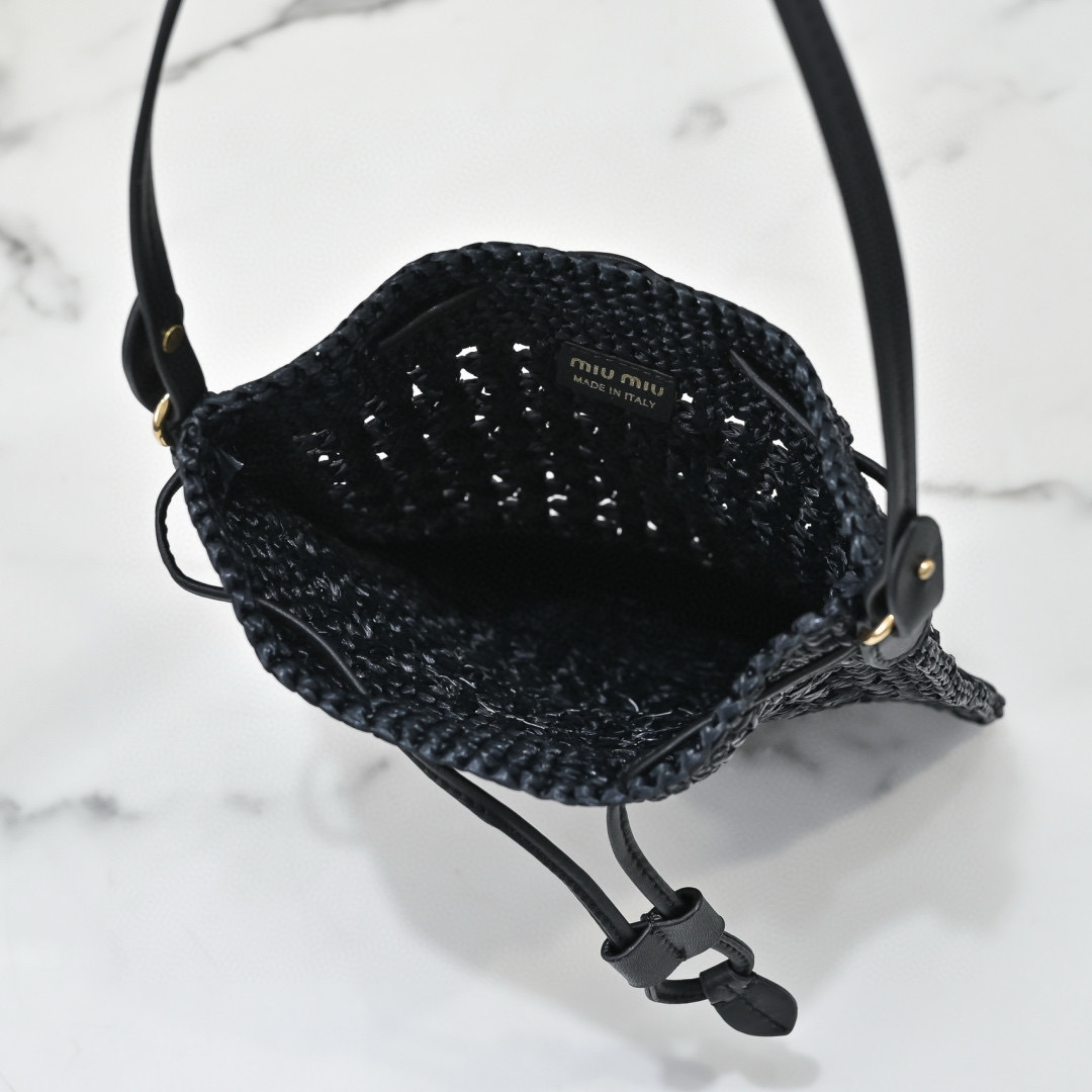 Miu Miu Black Raffia-Effect Woven Mini Bag with beige logo, leather strap, and drawstring closure, size 20 x 23 cm.