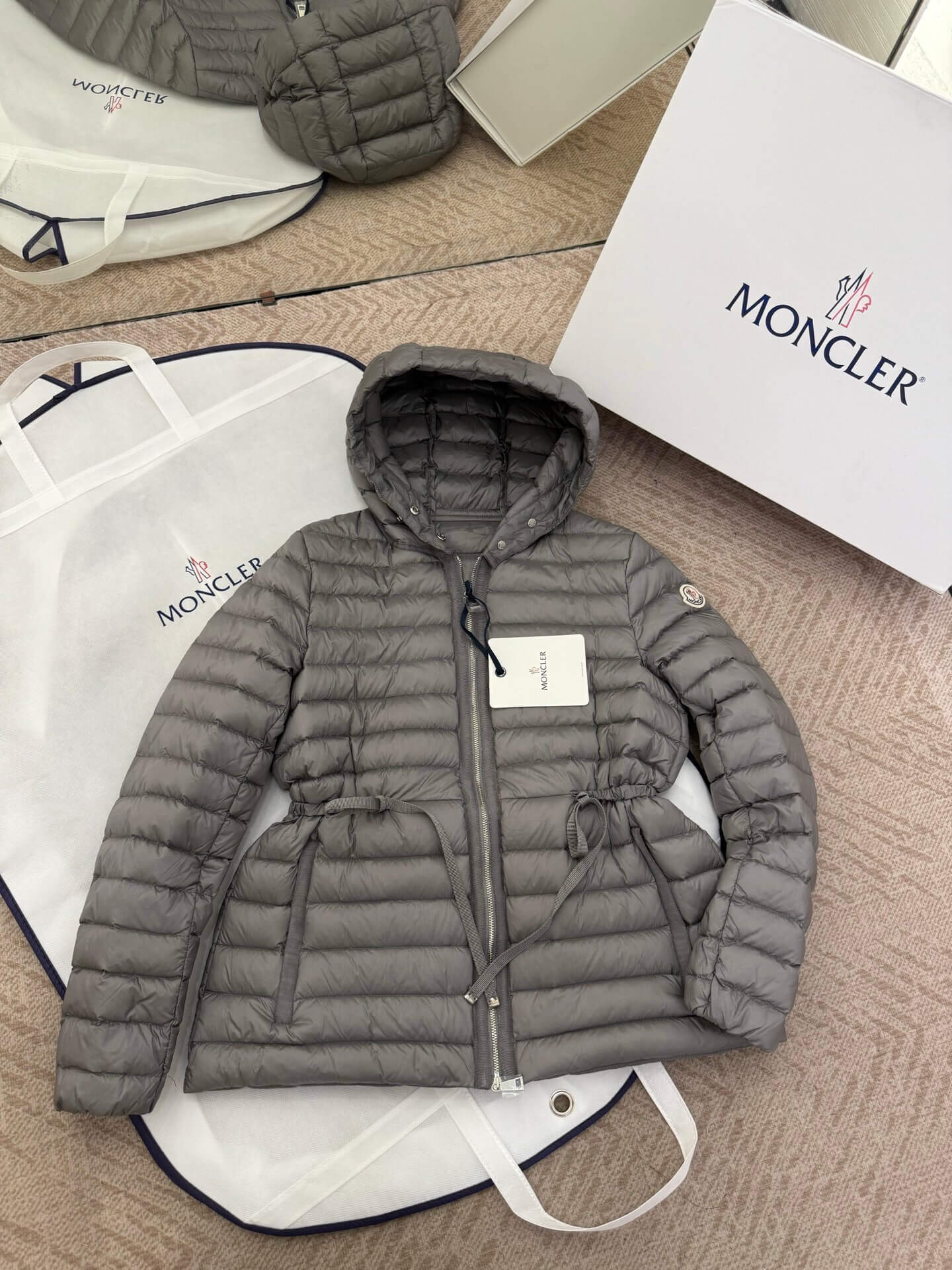 Moncler women's thin hooded down jacket in gray