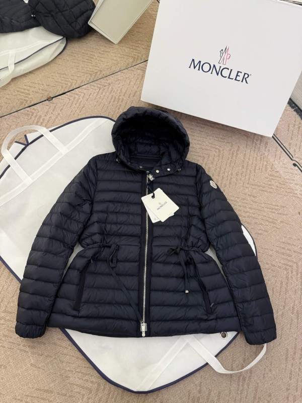 Moncler women's thin hooded down jacket in a navy blue color.