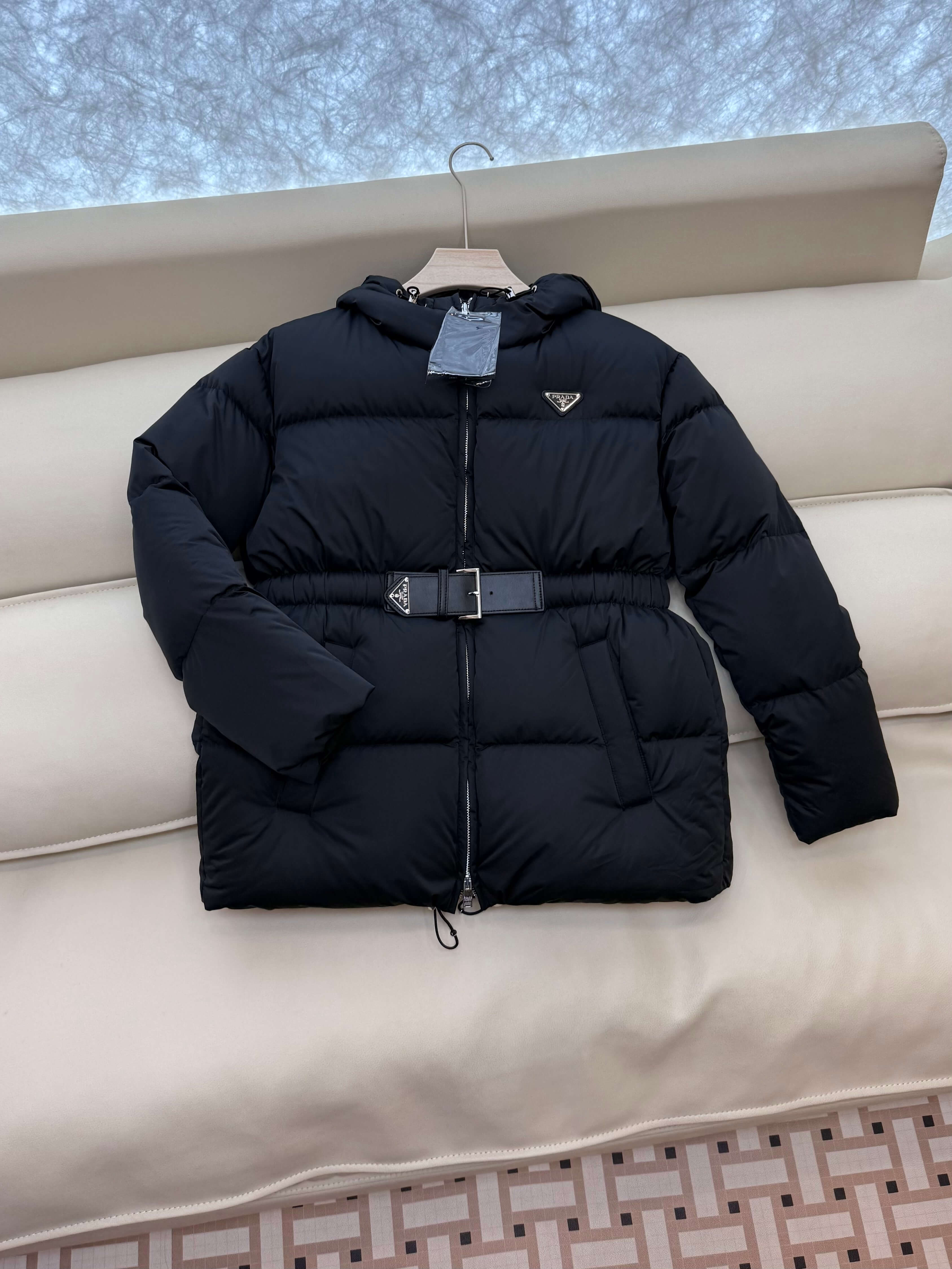 Prada Belted Puffer Women's Hooded Jacket in black. - Image 3