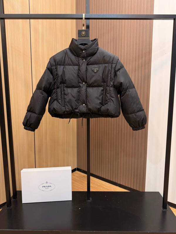 Prada Removable Sleeve Down Jacket in black.