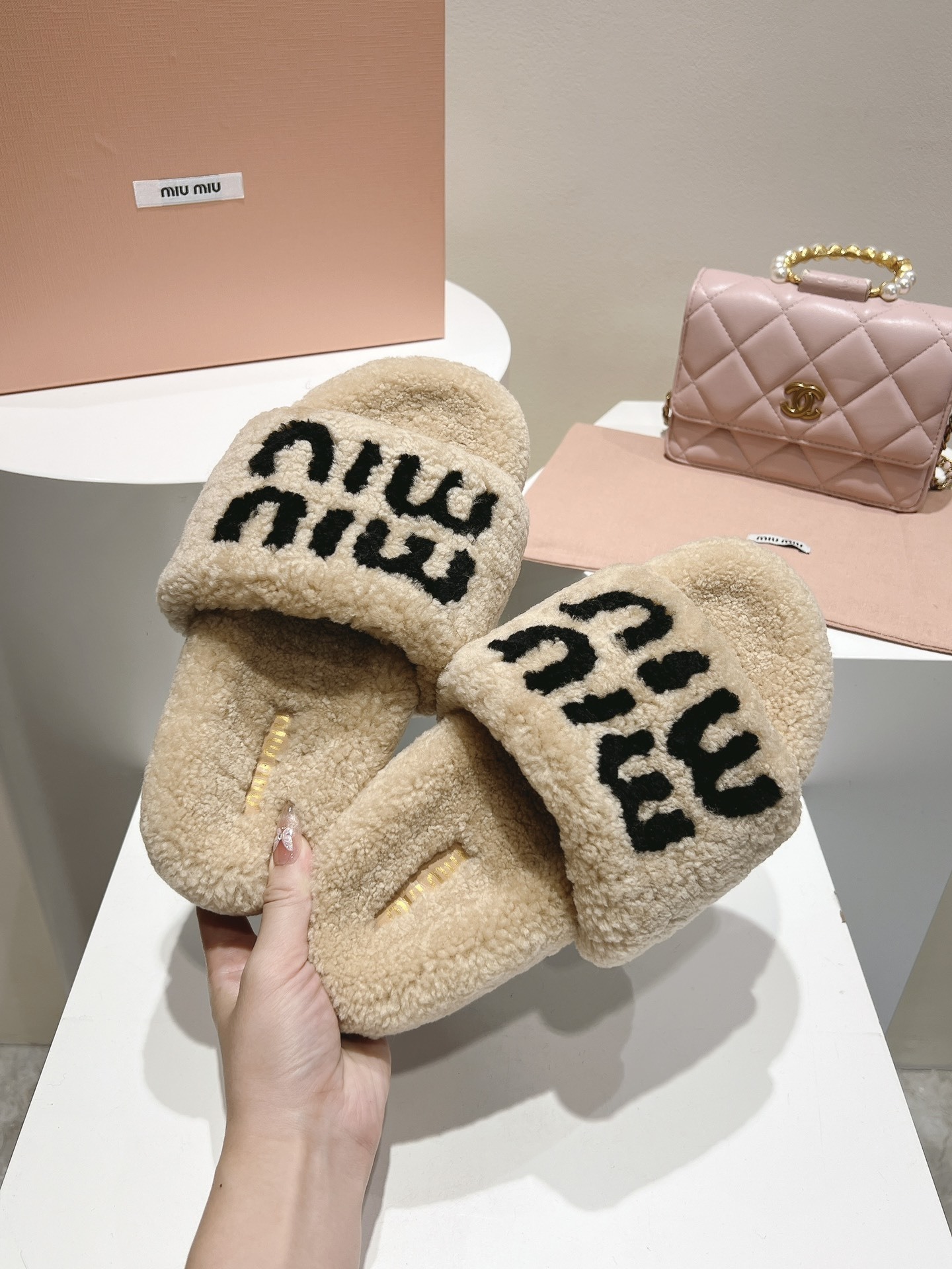 Miu Miu Beige and Black Logo Shearling Slides - Image 3