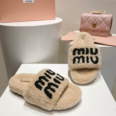 Miu Miu Beige and Black Logo Shearling Slides