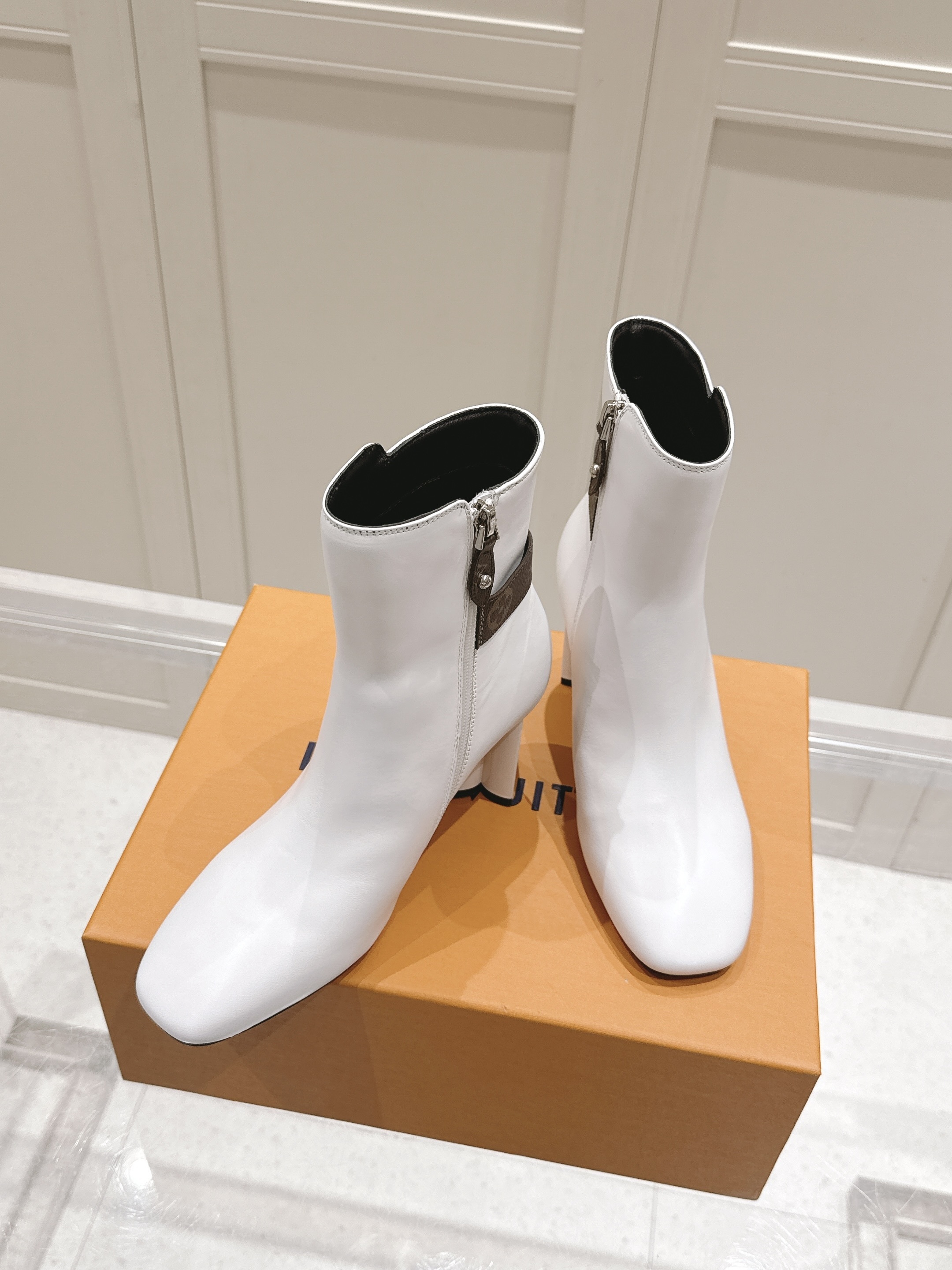 Louis Vuitton White Leather Monogram Buckle Ankle Heels