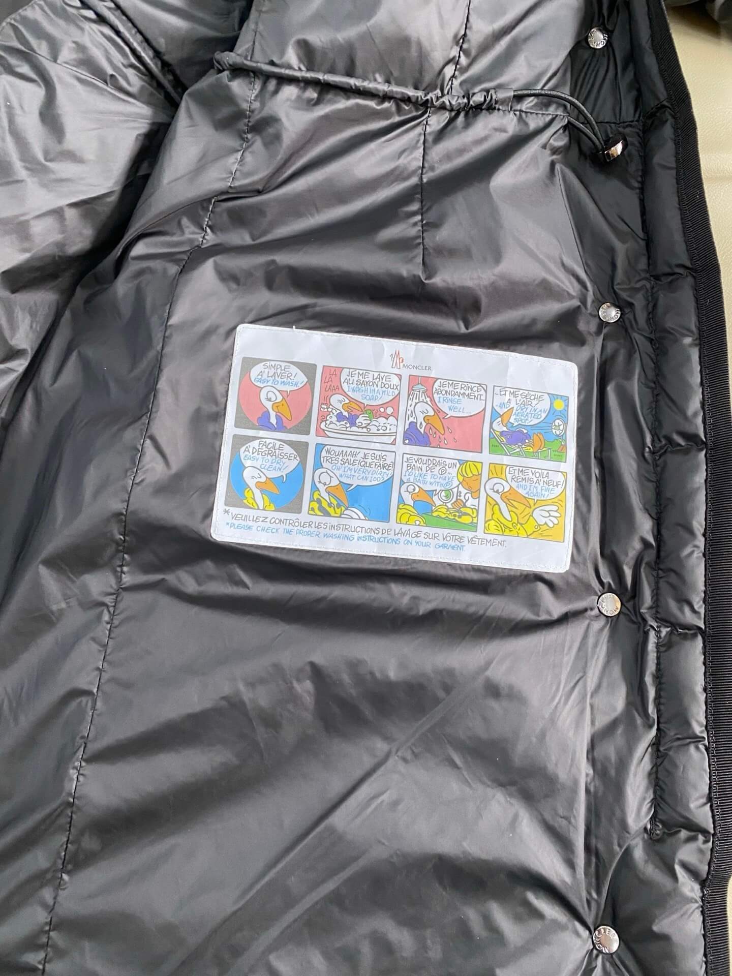 Moncler Hirmafur long women's down jacket- Black - Image 15