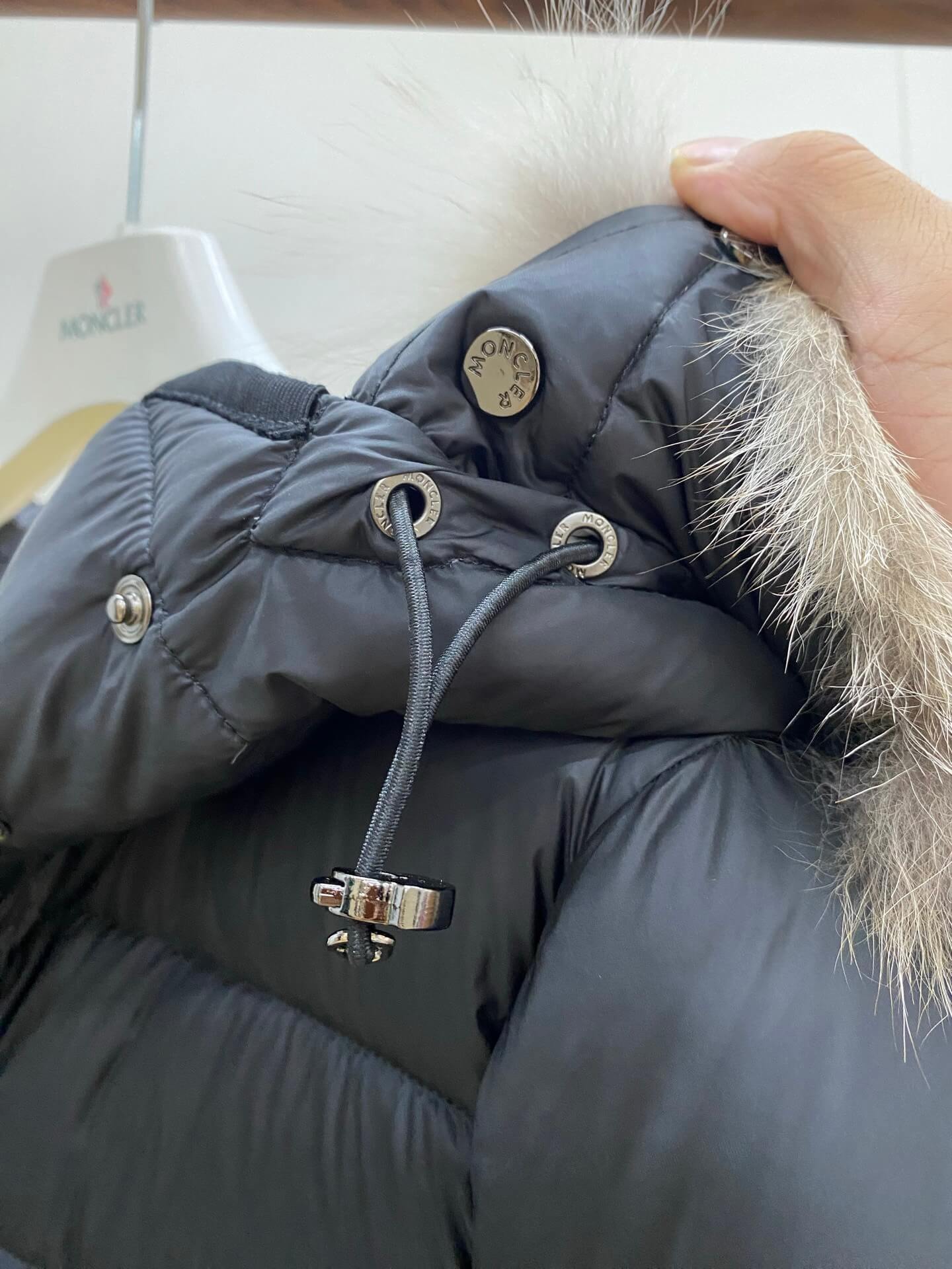 Moncler Hirmafur long women's down jacket- Black - Image 11