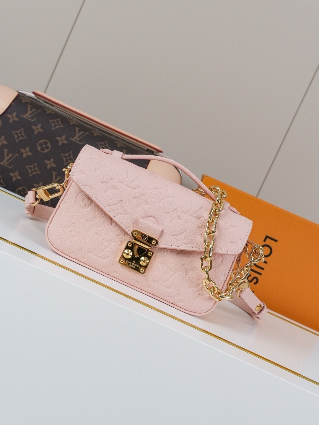 Louis Vuitton Pochette Métis East West bag in Rose Trianon Monogram Empreinte Leather with Gold Hardware