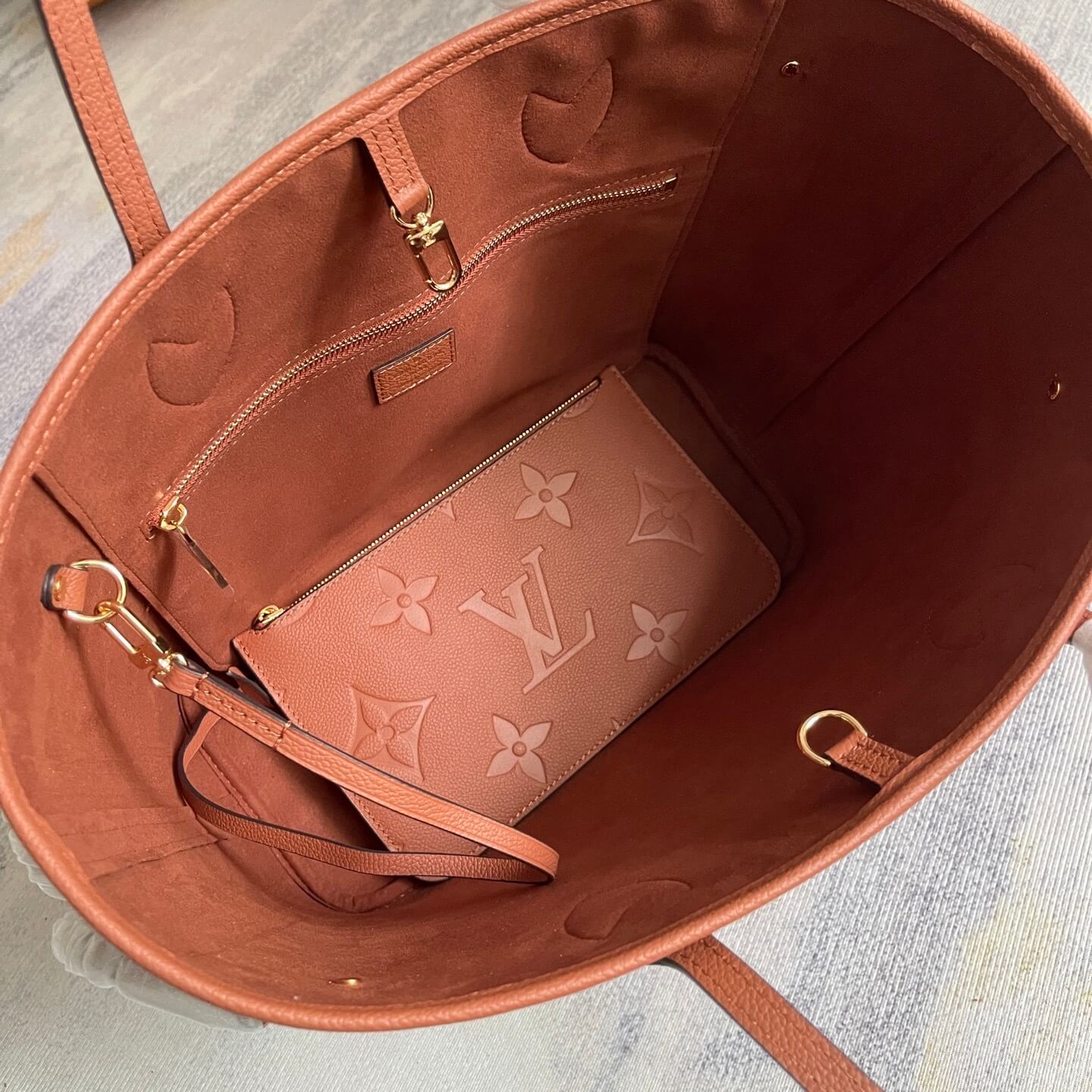 Louis Vuitton Neverfull MM Tote Bag in Cognac Monogram Empreinte Giant Leather with Pouch - Image 8