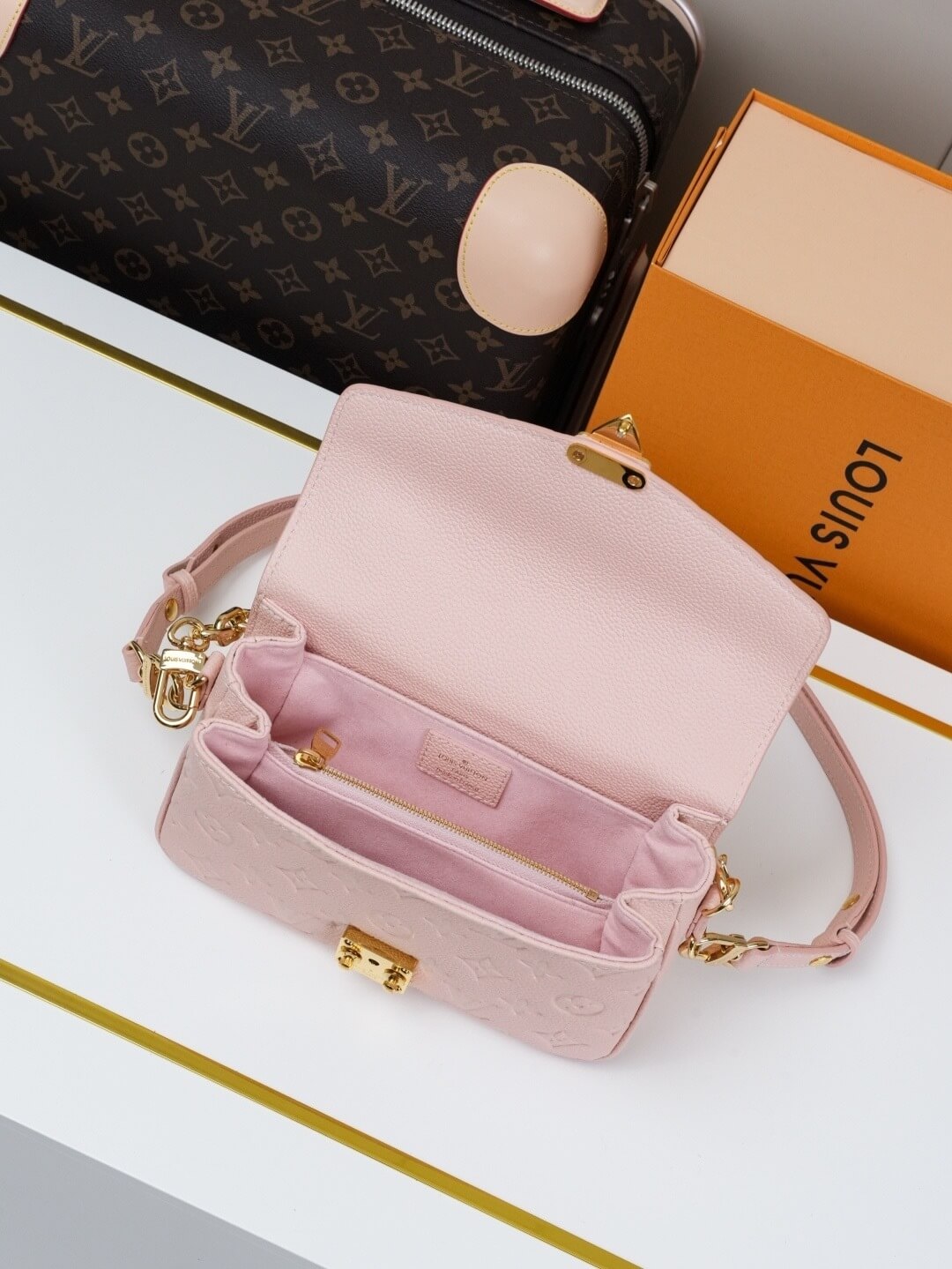 Louis Vuitton Pochette Métis East West bag in Rose Trianon Monogram Empreinte Leather with Gold Hardware - Image 8