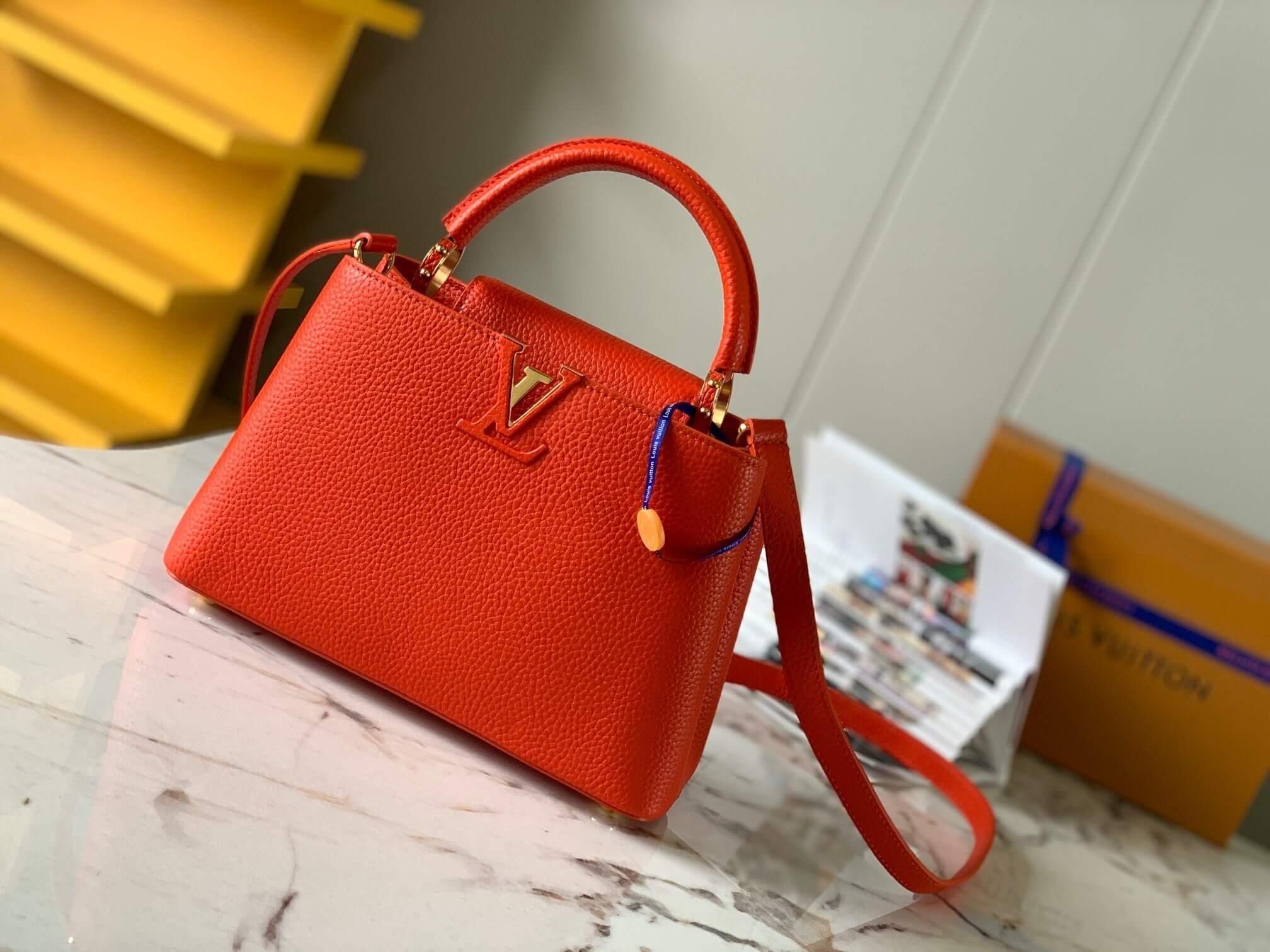 Louis Vuitton Capucines BB Taurillon Leather Handbag in Orange