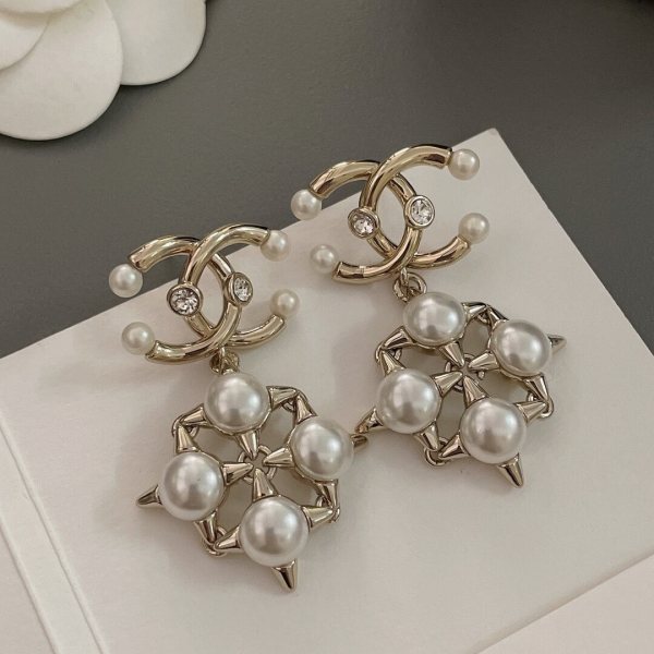 Chanel CC Drop Earrings in Gold with Pearl & Crystal Starburst Design
