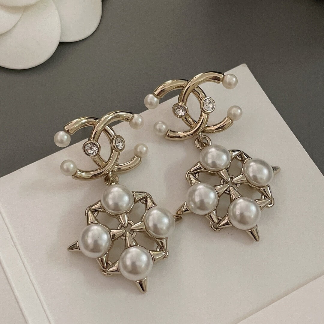 Chanel CC Drop Earrings in Gold with Pearl & Crystal Starburst Design