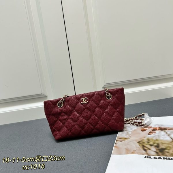 Chanel Burgundy Caviar Quilted Mini Shopping Tote Bag with Gold-Tone Hardware.