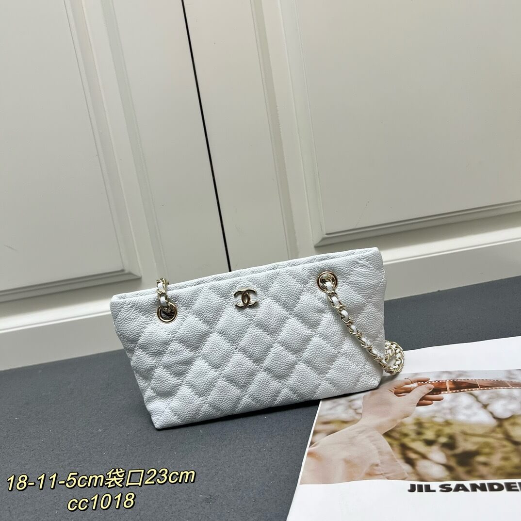 Chanel White Caviar Quilted Mini Shopping Tote Bag with Gold-Tone Hardware.