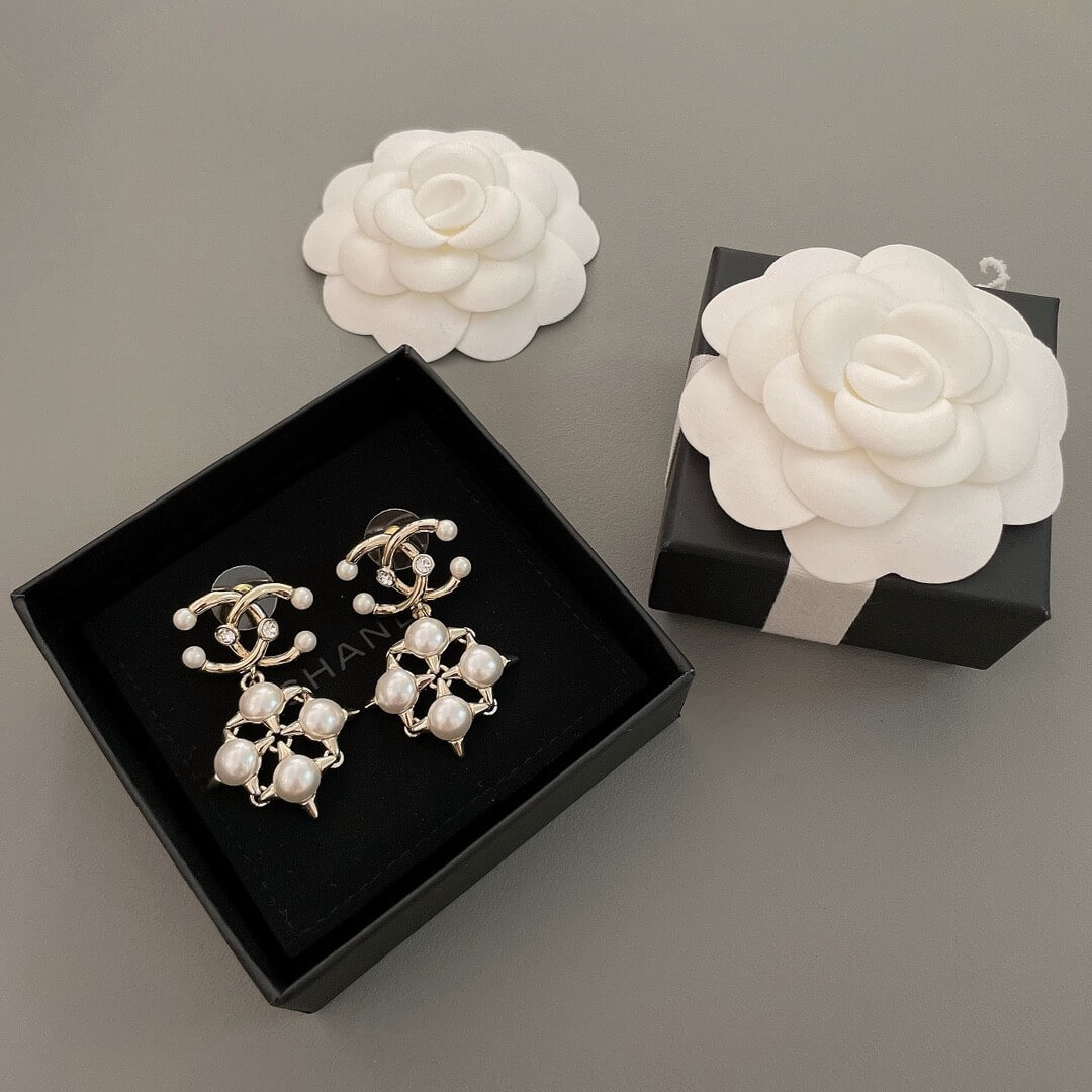 Chanel CC Drop Earrings in Gold with Pearl & Crystal Starburst Design - Image 3