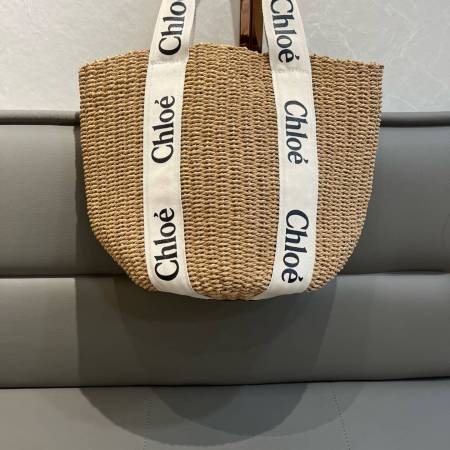 Chloé Woody Medium Basket Bag in White Woven Straw with Logo Webbing Straps.