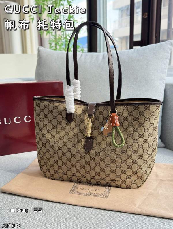 Gucci Jackie 1961 Medium GG Supreme Canvas Tote Bag with Piston Closure
