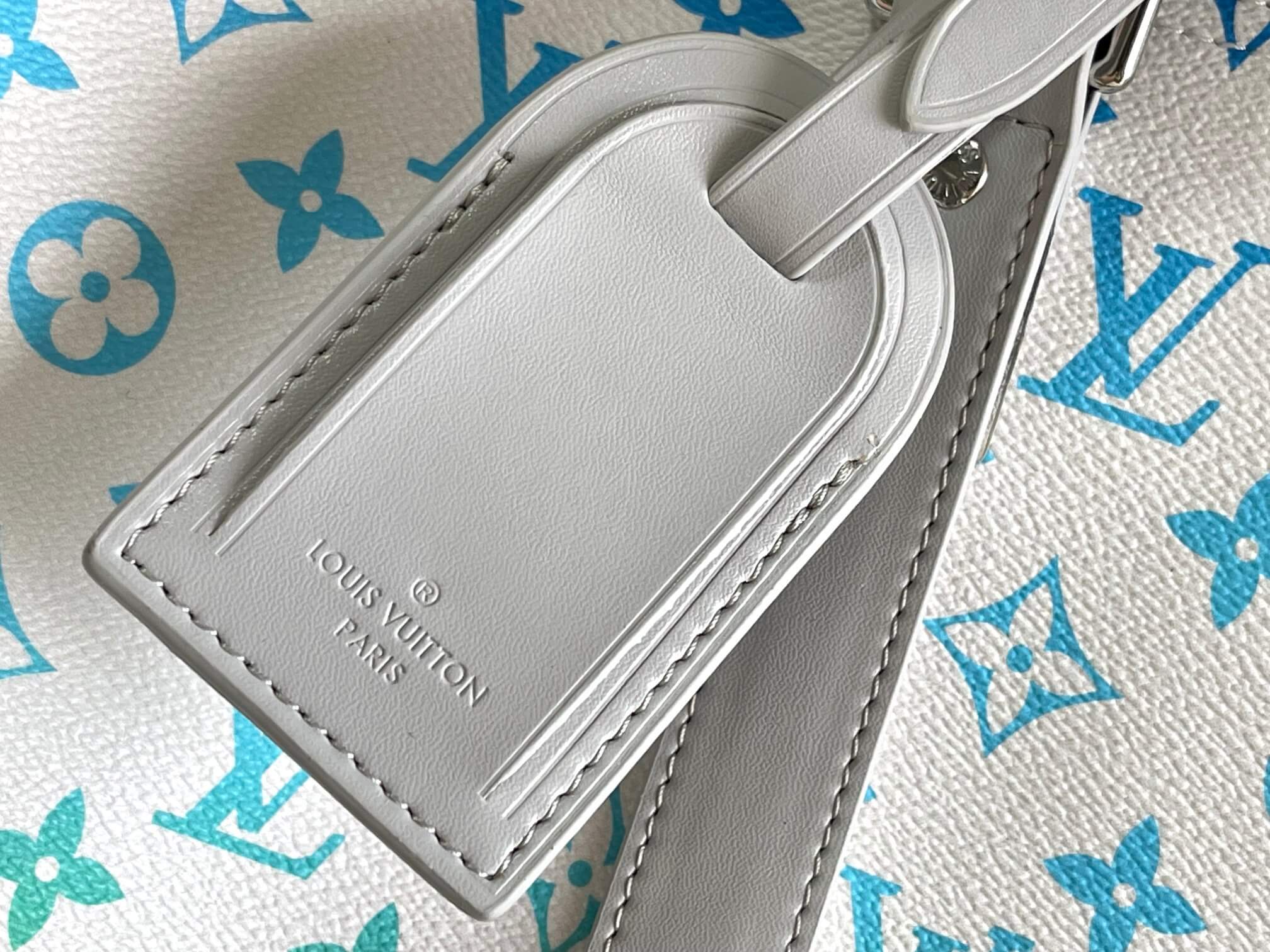 Louis Vuitton Monogram Sunset Keepall Bandoulière 50 White Rainbow Canvas Travel Bag - Image 5