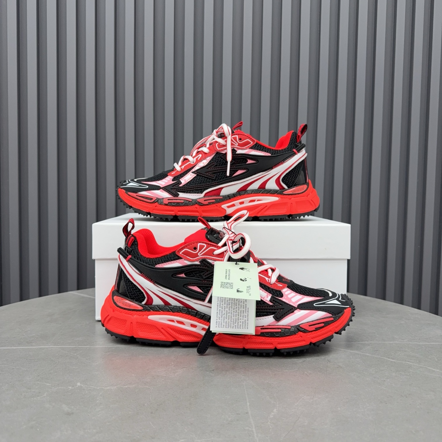 Off-White Be Right Back sneakers in black and red.
