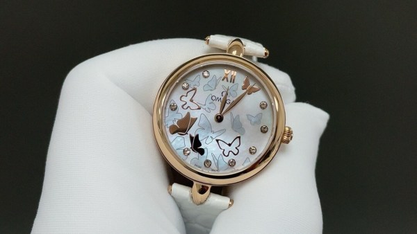 Omega De Ville Prestige Butterfly 18K Rose Gold Mother of Pearl Diamond Automatic Ladies Watch.