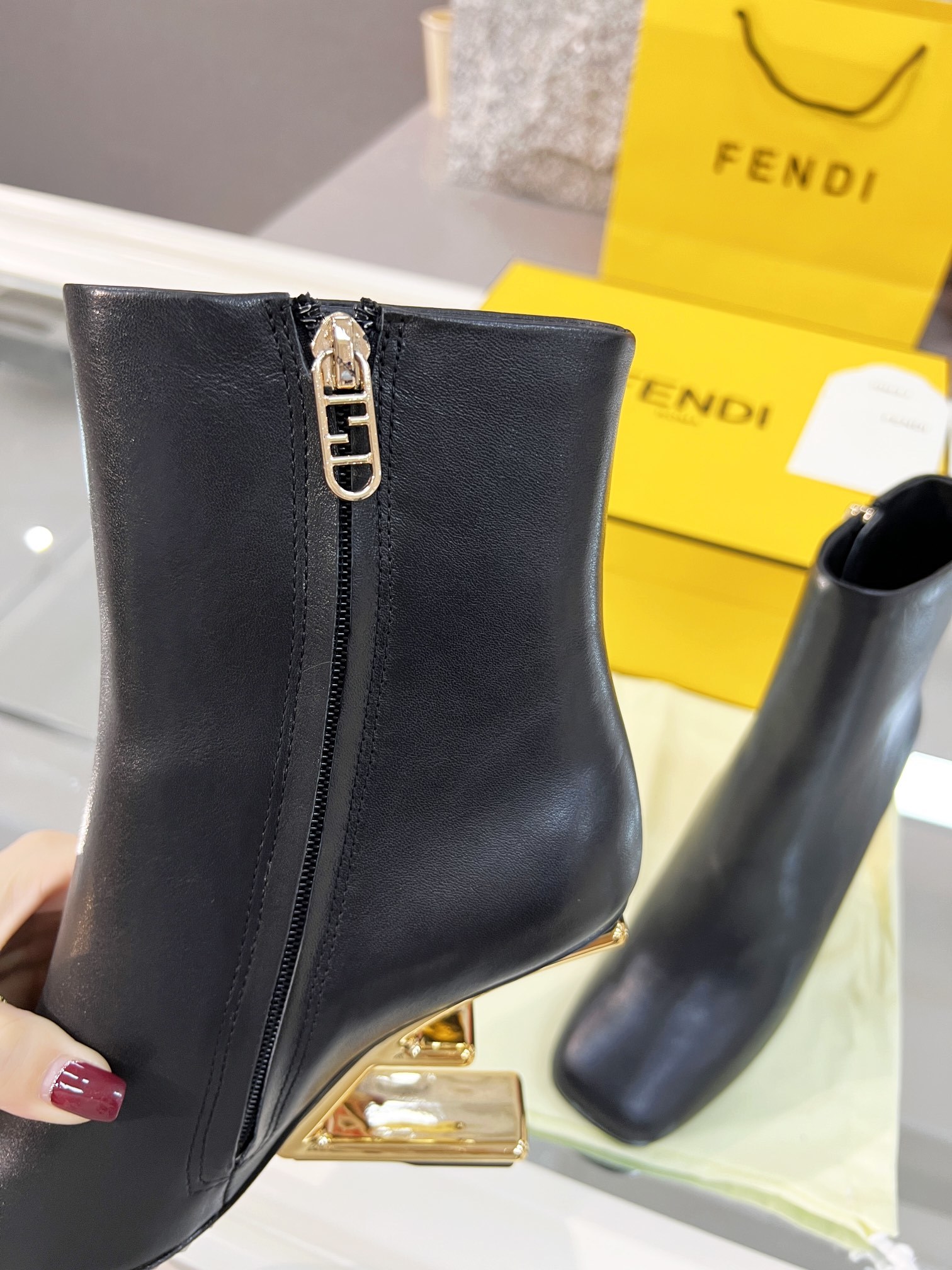 Fendi Black Leather Ankle Boots with Gold-Tone Logo Heel - Image 8