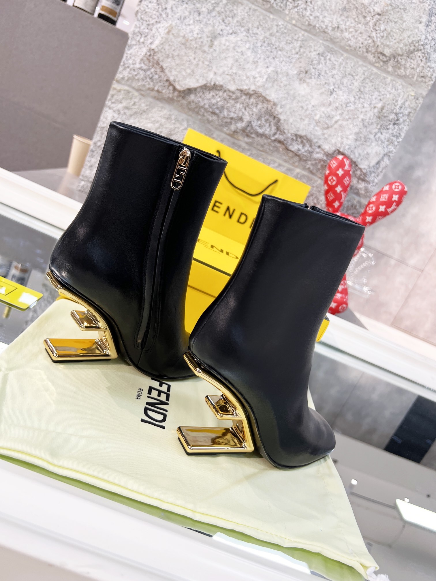 Fendi Black Leather Ankle Boots with Gold-Tone Logo Heel - Image 6