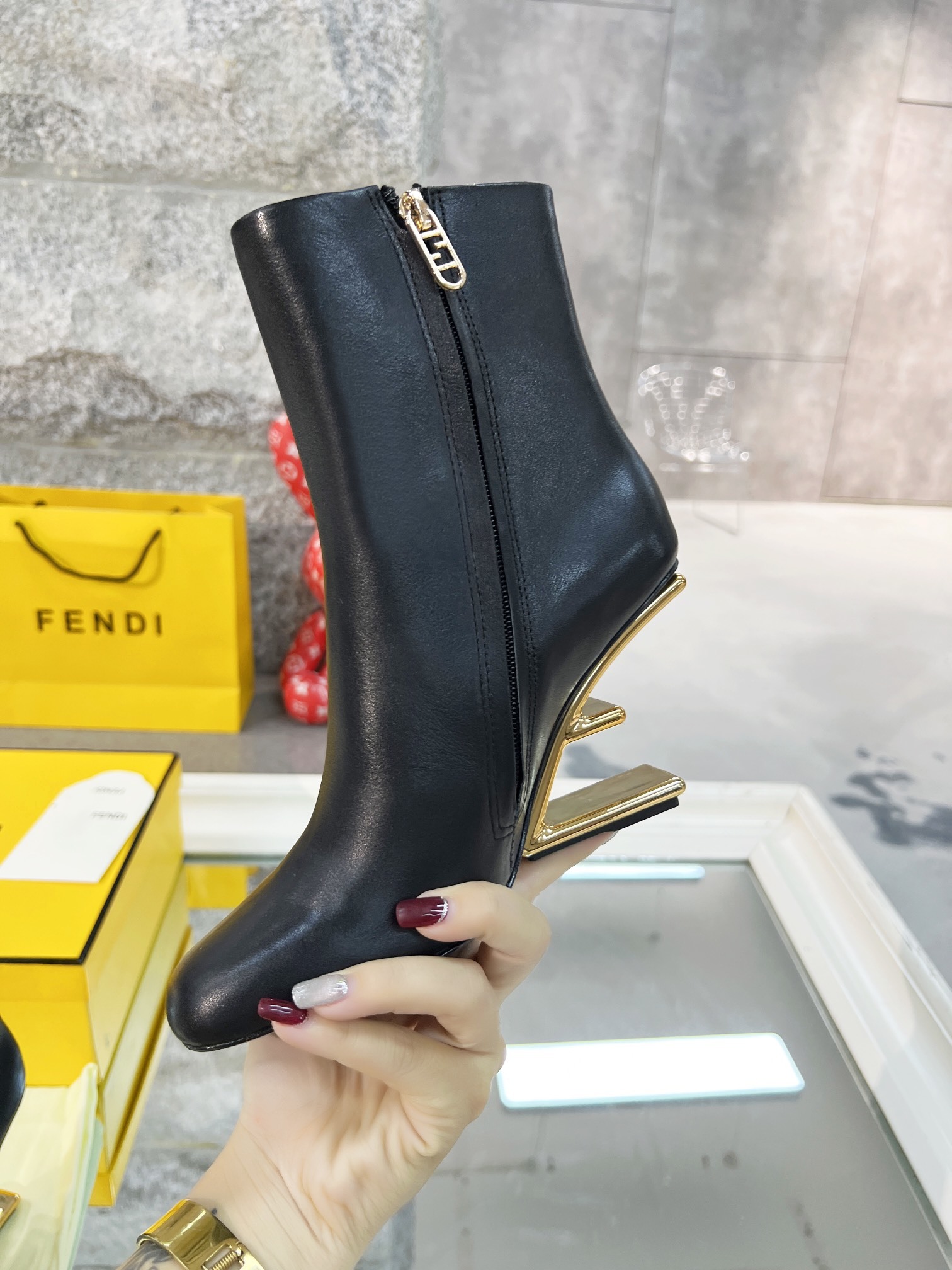 Fendi Black Leather Ankle Boots with Gold-Tone Logo Heel - Image 4