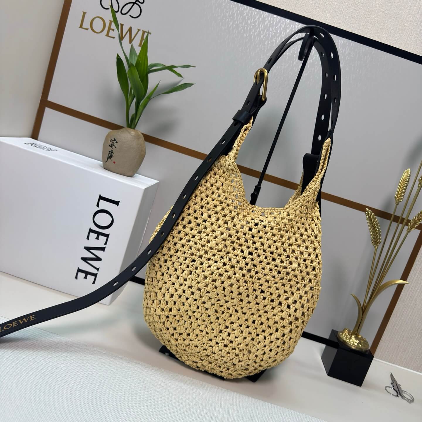 Loewe Punch Hole Hobo Bag in Handwoven Raffia with Black Calfskin Trim