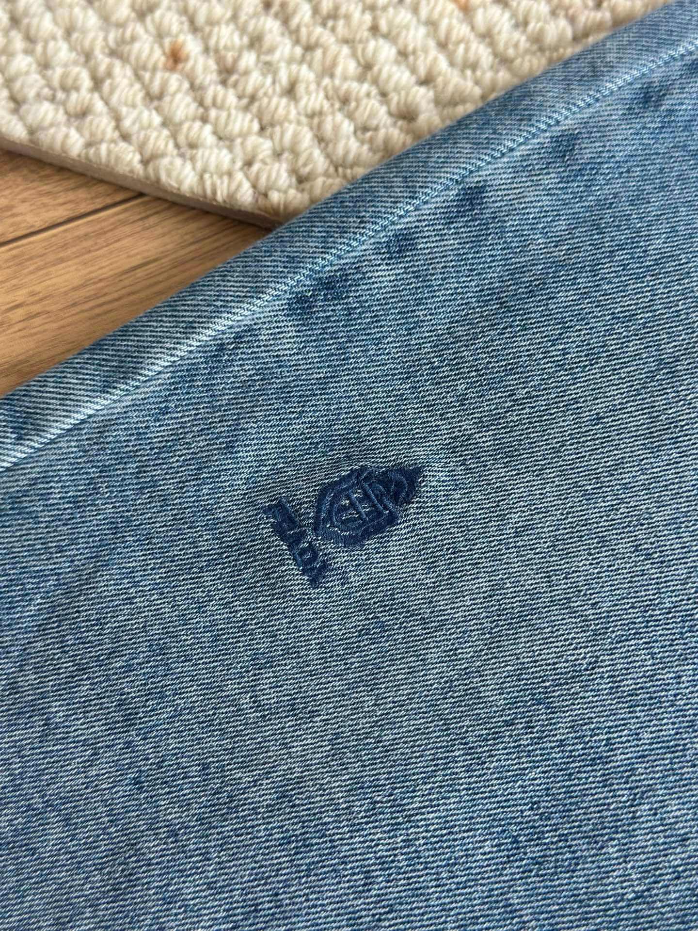 Prada Women's High-Waisted Retro Wash Denim Midi Skirt with Small Logo Embroidery - Image 6