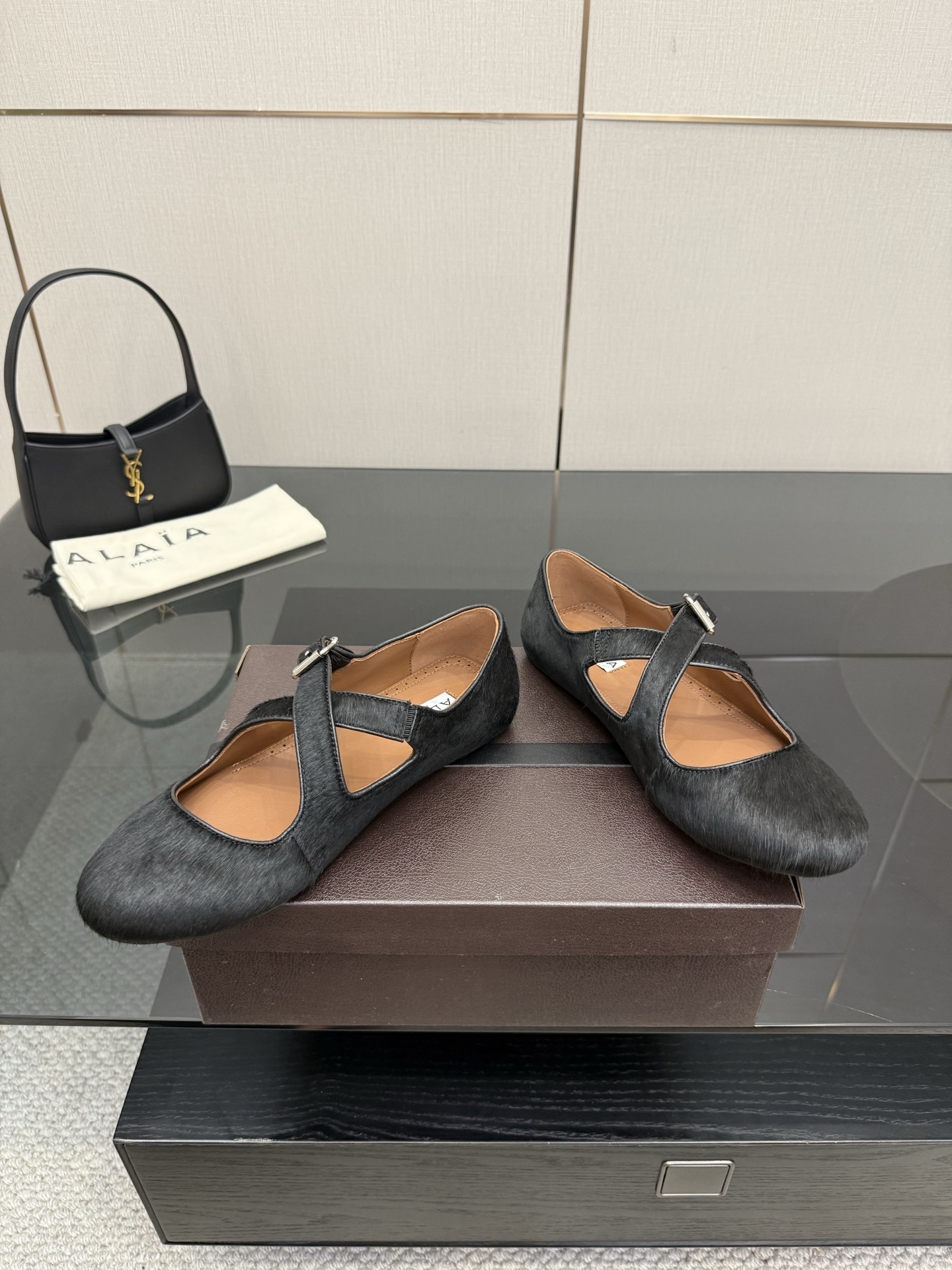 Alaïa Black Haircalf Criss Cross Buckled Ballet Flats