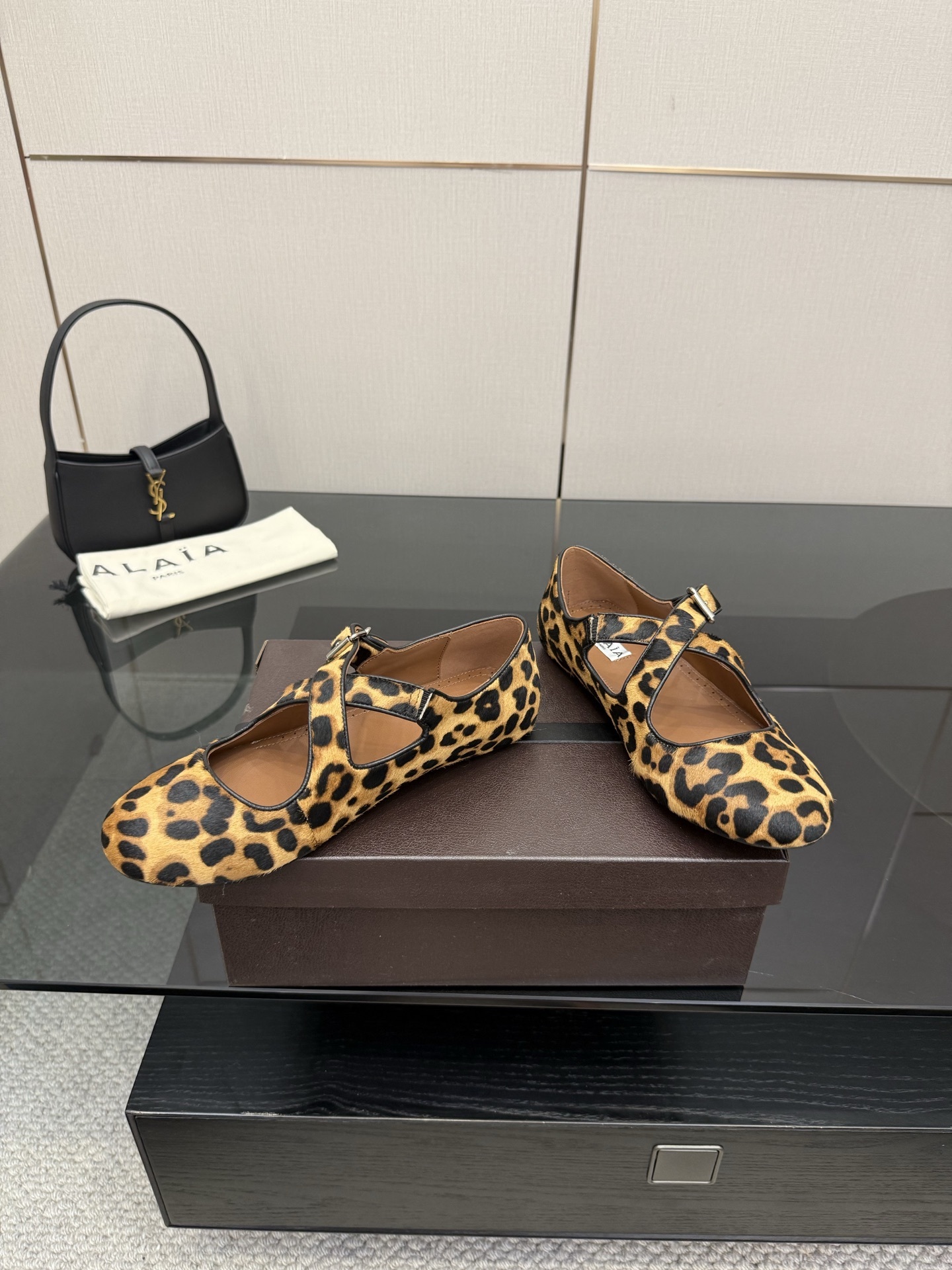 Alaïa Leopard Haircalf Criss Cross Buckled Ballet Flats