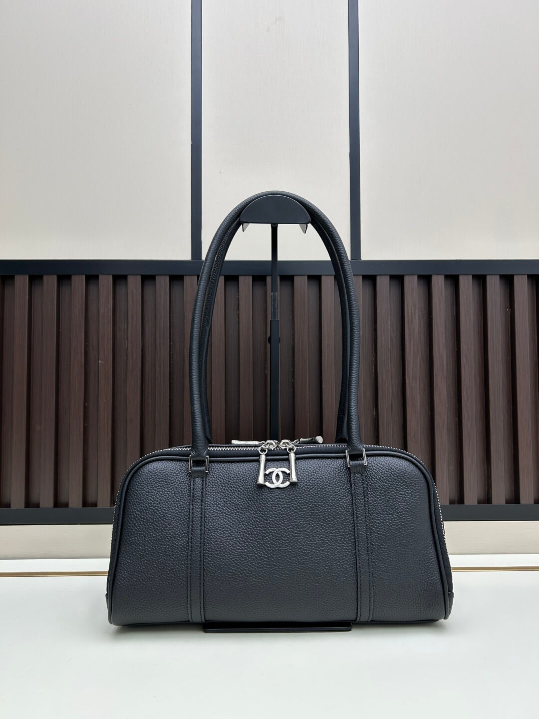 Chanel Black Caviar Leather Bowling Bag with Silver Hardware.