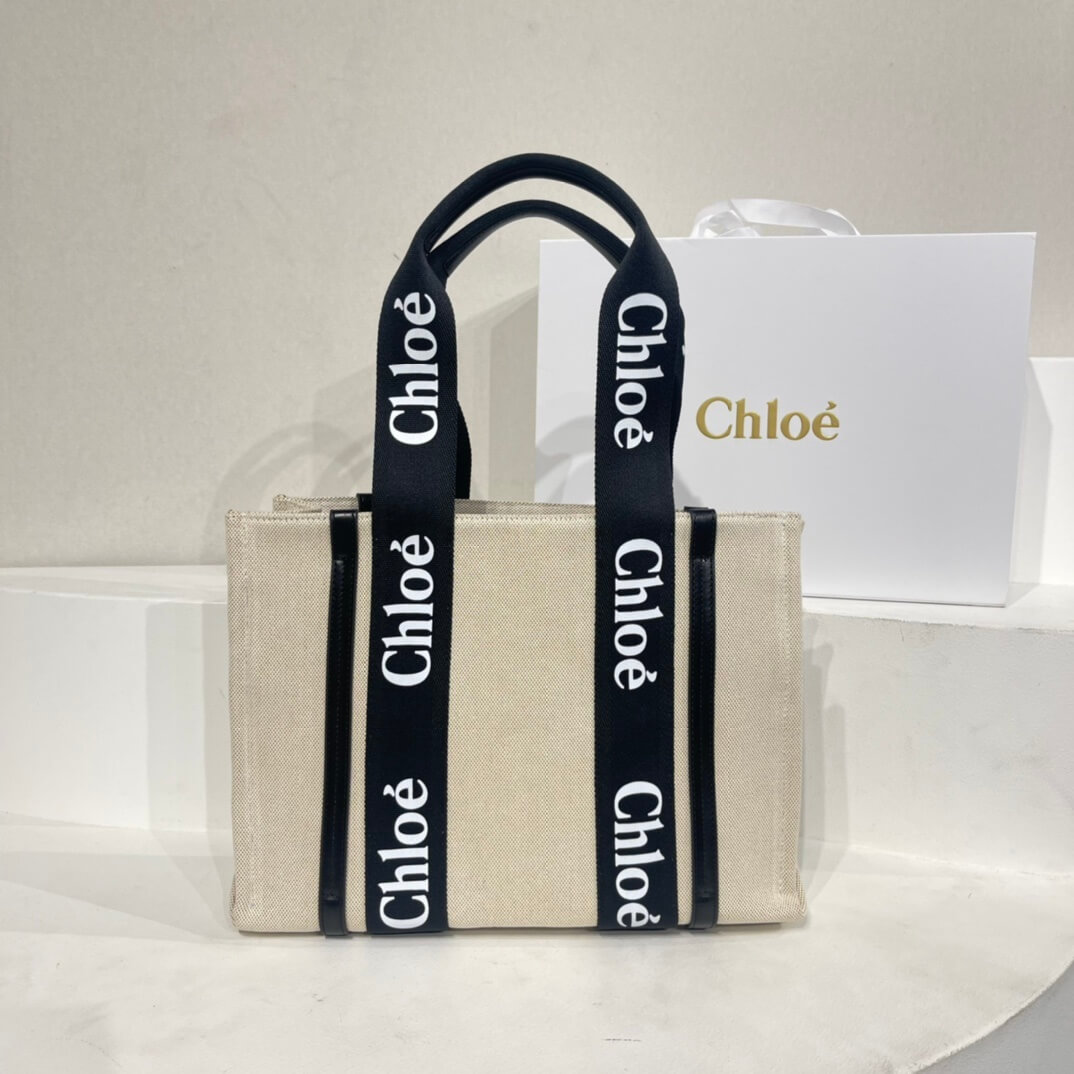 Chloé Small Woody Tote Bag in Canvas and Black Leather.