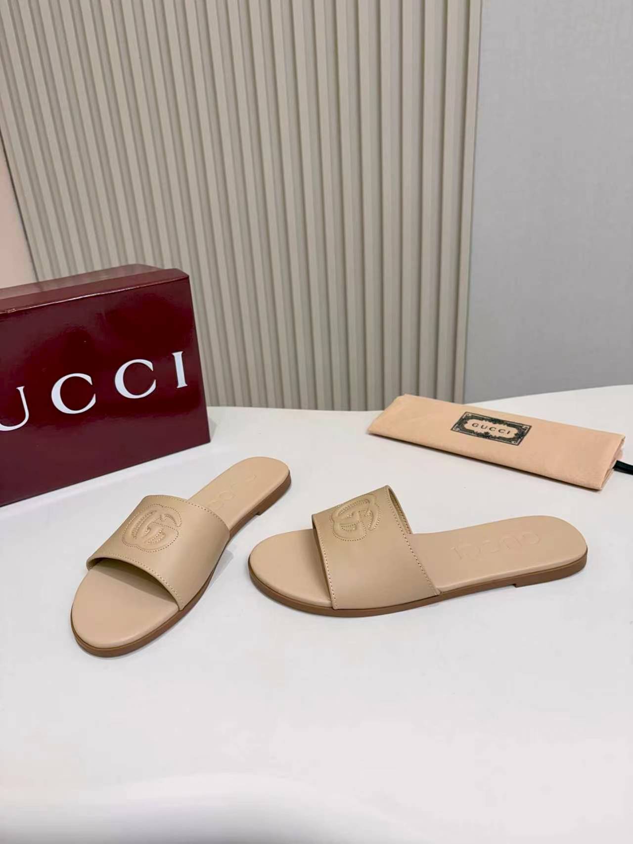 Gucci Beige Double G Embossed Women’s Flat Slide Sandals