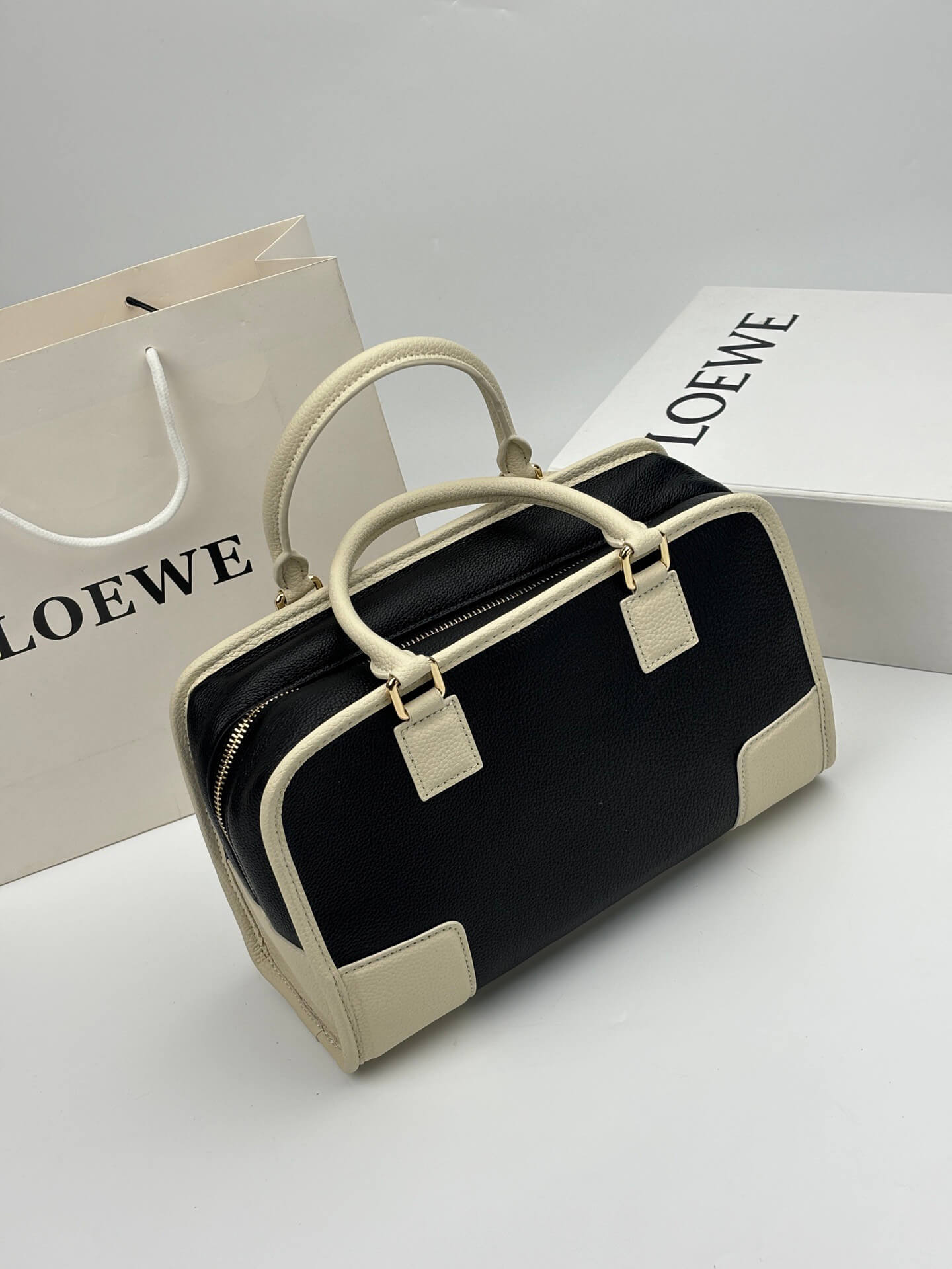 Loewe Amazona 28 Black and Cream Grained Calfskin Leather Top Handle Bag. - Image 4