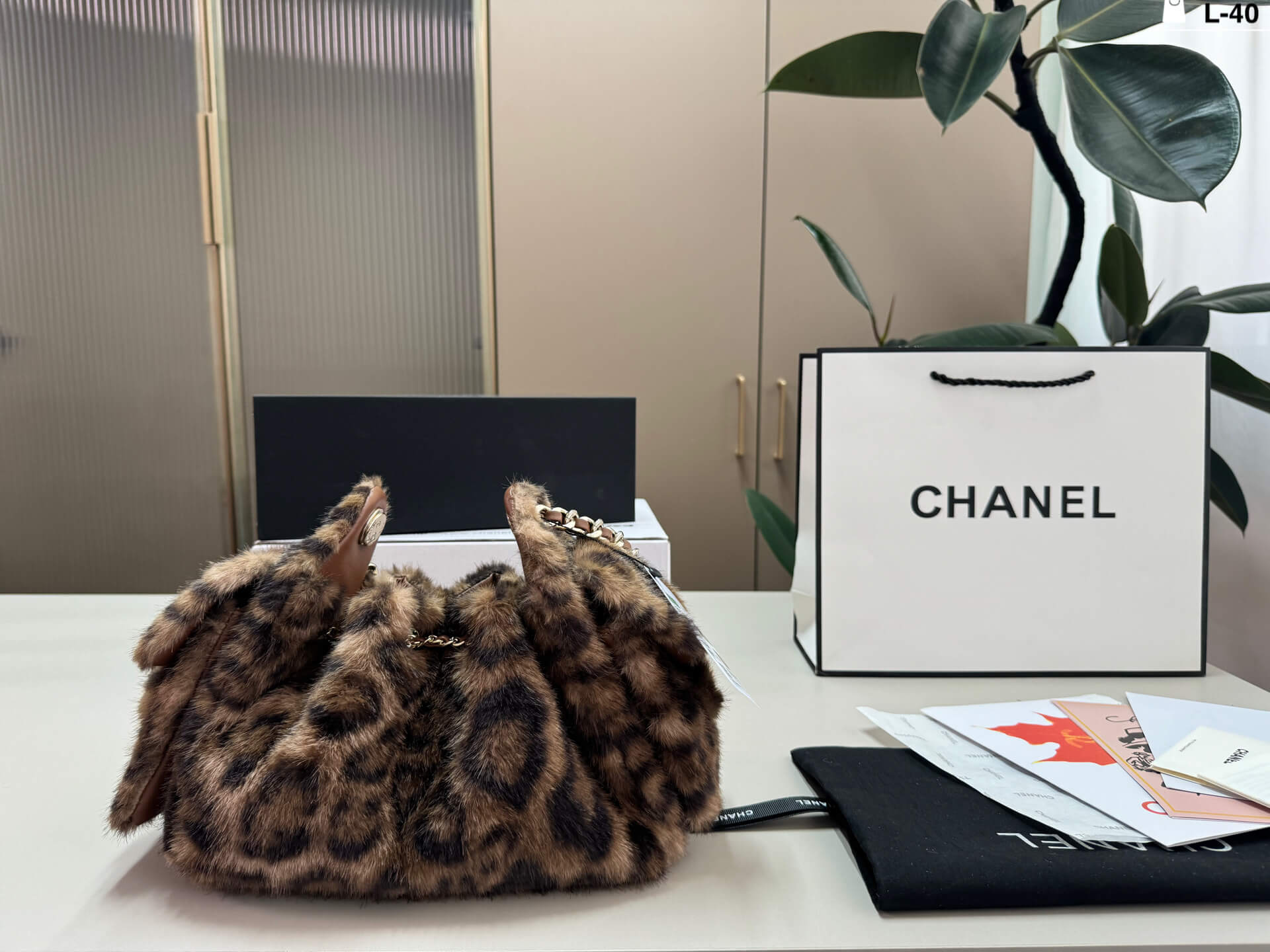 Chanel Leopard Print Faux Fur Mini Drawstring Shoulder Bag with Gold Chain - Image 4