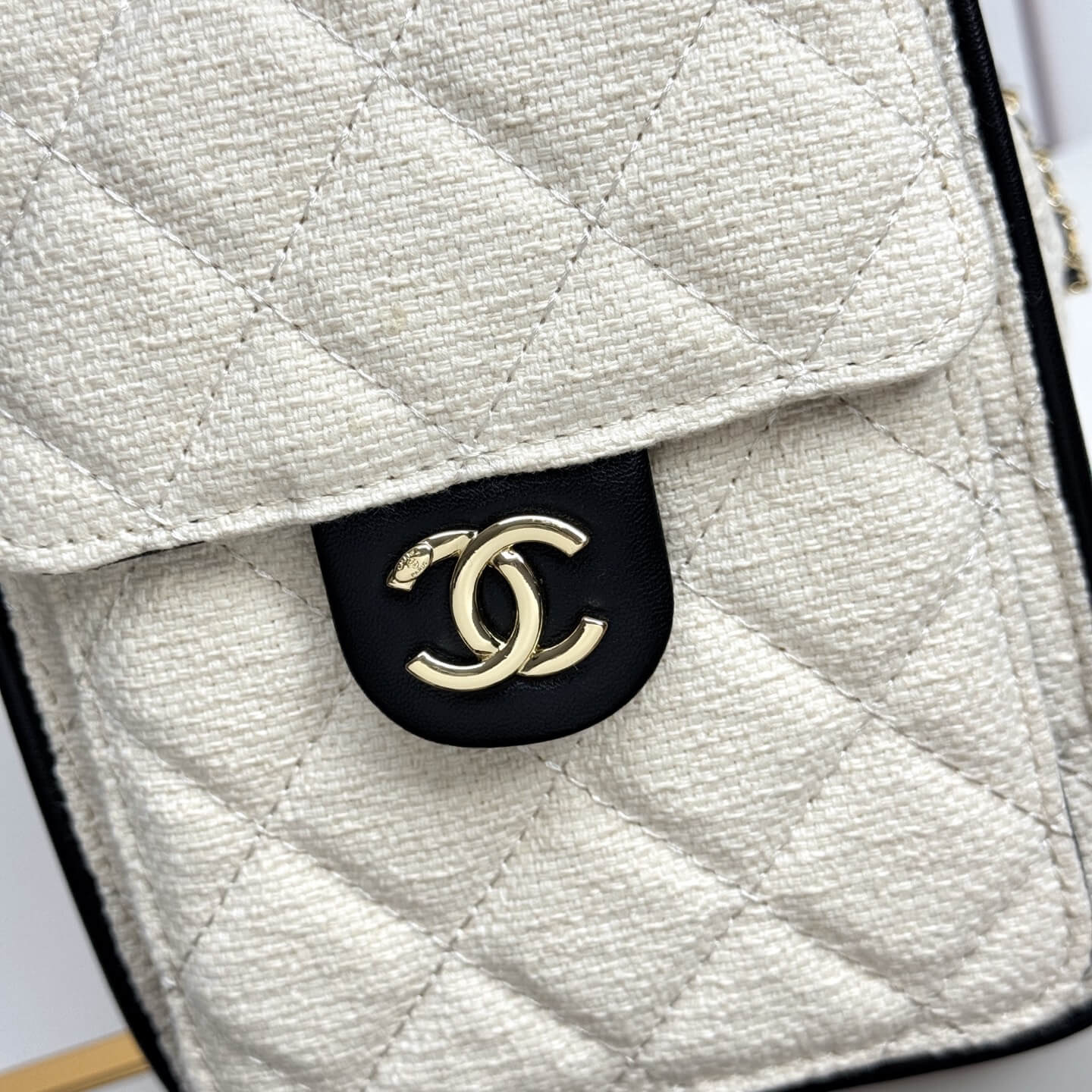 Chanel Quilted Canvas Hobo Bag with Black Trim and Gold-Tone Chain Hardware. - Image 6