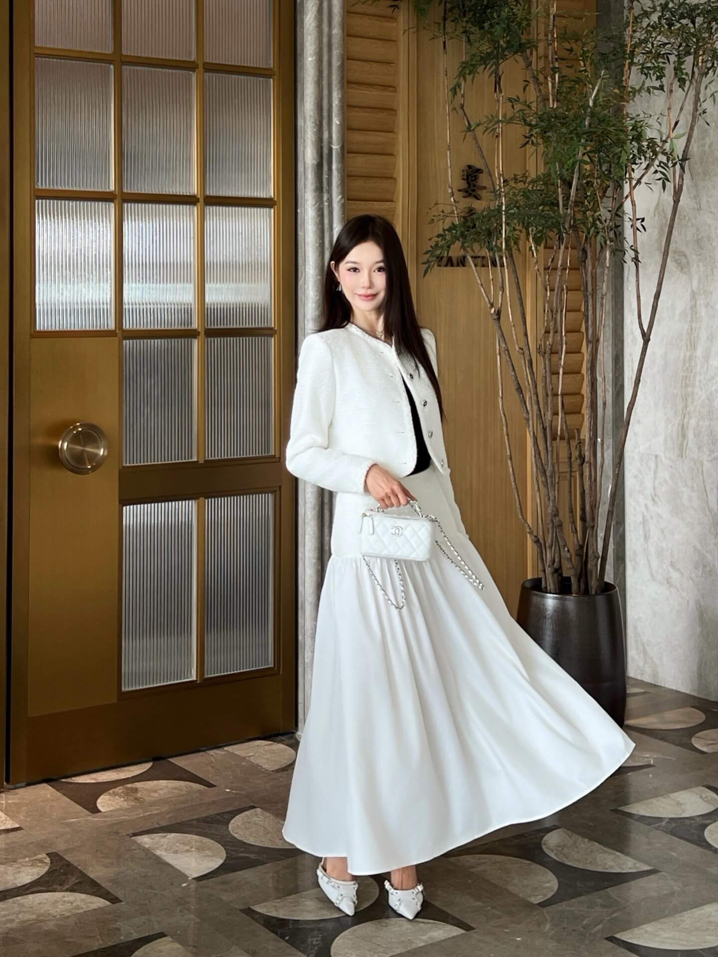 Chanel White Bouclé Tweed Cropped Jacket and Drop-Waist Midi Skirt Set.
