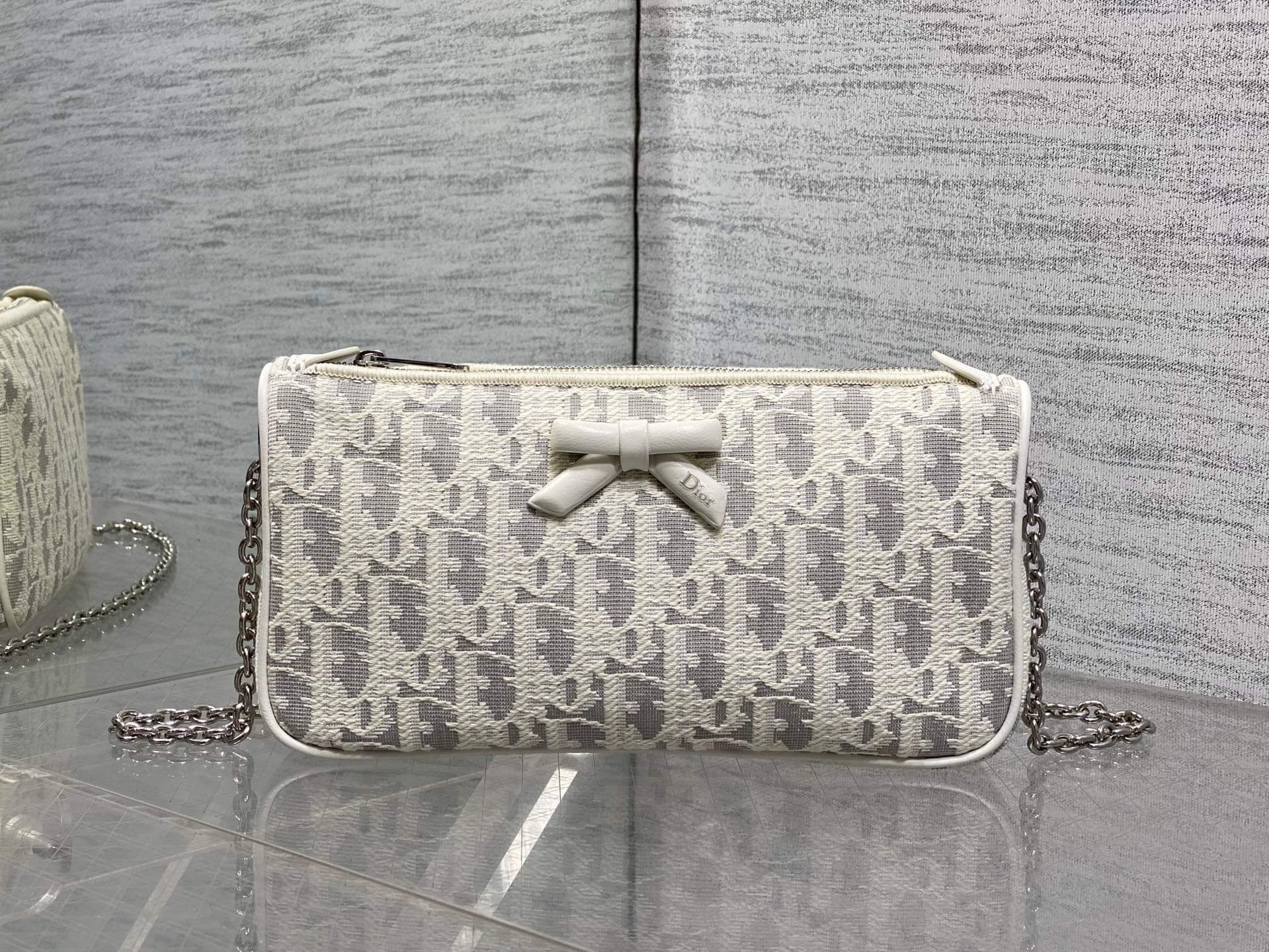 Christian Dior Oblique Bow Pouch With Chain White Canvas.